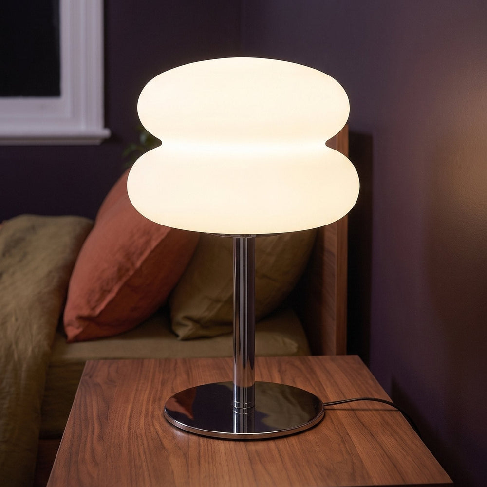 Close-up of the mushroom lamp lit on a nightstand