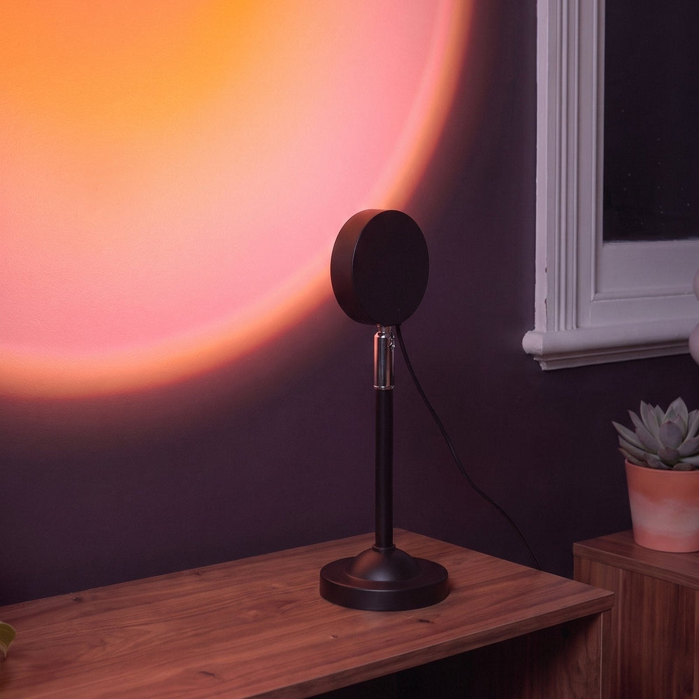 Sunset lamp on a shelf lighting a bedroom wall